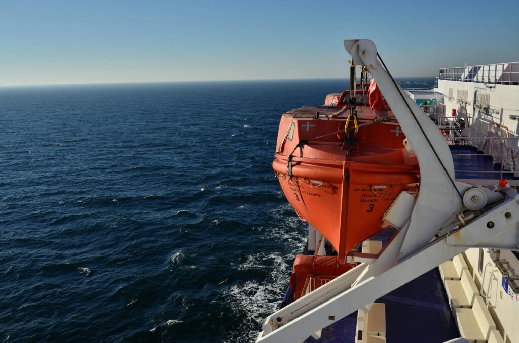 a ferry with lifeboats cruises through the vast ocean near karlskrona, sweden.